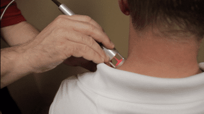 Demonstration of a Klaser at work on a patient