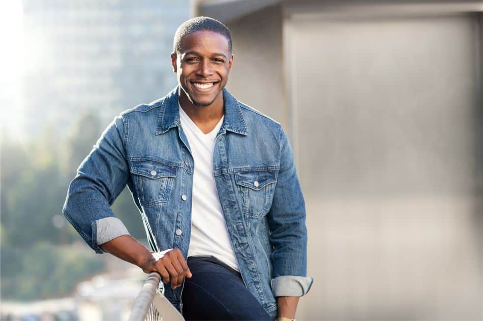 headache treatment in rochester PE banner Smiling man outdoors, conveying confidence, well-being, or positive treatment results.