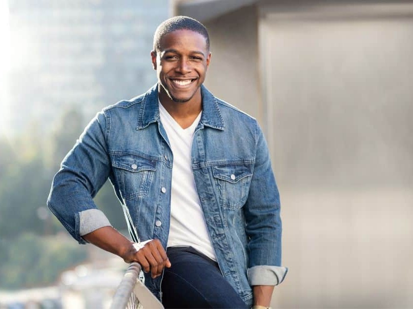 headache treatment in rochester PE feature Smiling man outdoors, conveying confidence, well-being, or positive treatment results.